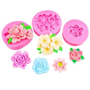 Pink silicone flower mold set for resin and fondant featuring rose and lotus designs