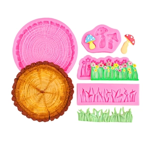 Pink silicone fondant mold set featuring mushroom, grass, and tree stump designs