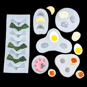 Silicone food molds for cake decorating featuring dumplings and noodle shapes