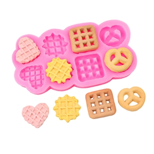 Moule en silicone rose pour biscuits cœur étoiles arc-en-ciel et décors chocolat