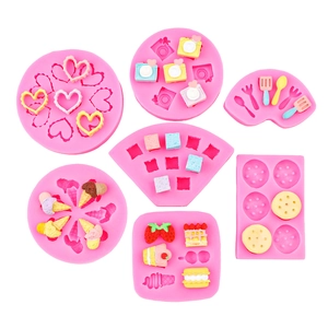 Pink silicone camera and heart shape molds for handmade chocolate and resin DIY crafts