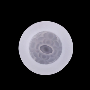 White silicone mold with floral petal relief for handmade candles and aromatherapy stones