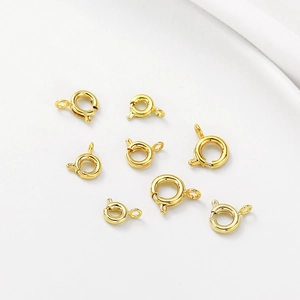 Macro detail of 14K gold filled spring ring clasps for DIY jewelry making and repair