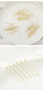 Makroaufnahme von 14K goldgefüllten Flachkopf-, Kugel- und Ösenstiften für Schmuck