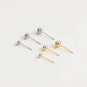 Detailed view of 14K gold and S925 silver ball stud earring posts with small loops