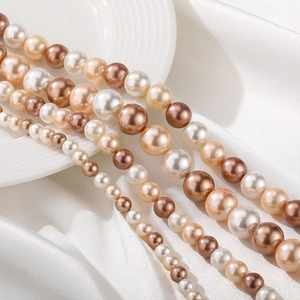 Perlas de concha natural en blanco y bronce para creación de joyas y pulseras DIY