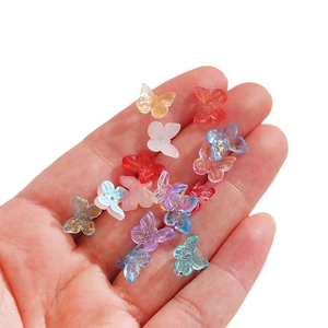Mix of colorful translucent butterfly glass beads with gold glitter for DIY jewelry