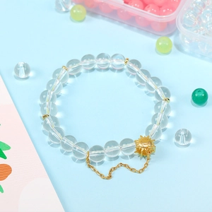 8mm jade-like glass beads bracelet with gold smiley sun pendant and metal chain