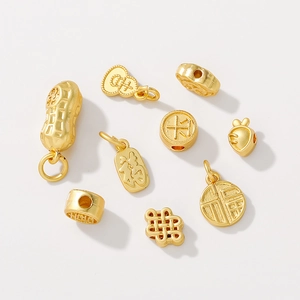 Matte gold DIY jewelry charms with traditional Chinese Fu and Gourd symbols for bracelets