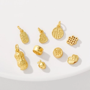 Set of 8 gold-plated Chinese charms including gourd and peanut for DIY jewelry making