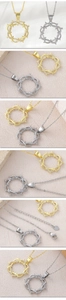 Dettaglio macro del ciondolo ad anello di spine oro e argento con zirconi bianchi