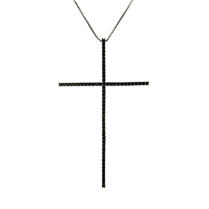 Vertical cross pendant necklace featuring black stones on a silver box chain