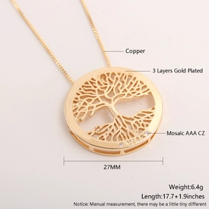 Macro view of gold-plated Tree of Life pendant with AAA cubic zirconia and Vida engraving