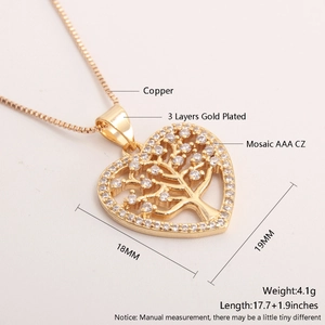 Detailed macro view showing the 18k gold plated tree of life heart pendant dimensions