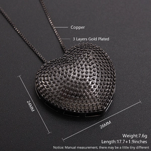 Detail of 24mm x 26mm textured heart pendant with 3 layers gold plated copper finish