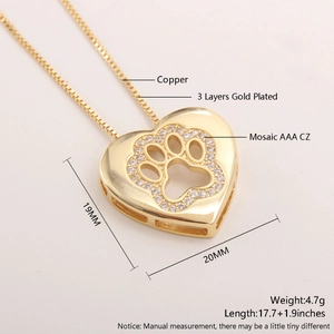 Detail of 18k gold plated copper heart necklace with AAA cubic zirconia and paw print