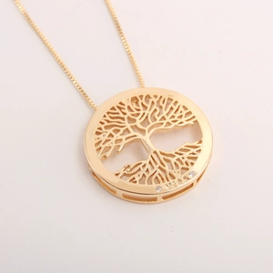Gold plated Tree of Life necklace featuring VIDA engraving and sparkling zircon accents