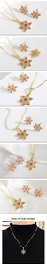 Dettaglio macro di collana e orecchini a fiore in oro 18k con zirconi rosa