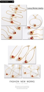 Detail of red heart pendant bracelet with golden crown and adjustable sliding clasp