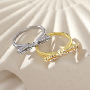 Elegante 18k Gold- und Silberbogenringe mit Pavé-Diamanten und doppeltem Banddesign