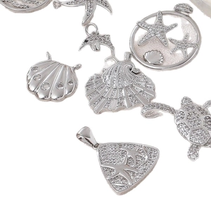 Meereslebewesen Anhänger Set mit Seestern und Delphin Motiven und klaren Zirkonsteinen