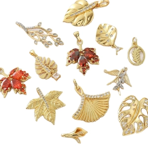 Gold maple leaf and botanical charms set for DIY jewelry making and necklace design