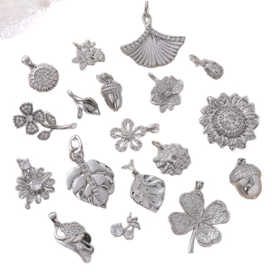 Collection of 17 silver floral pendants with micro-inlaid crystals for DIY jewelry making