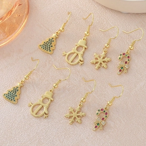 Christmas themed earrings set with 18k gold plated tree, snowman, and snowflake charms