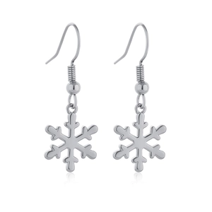 Detailed view of silver snowflake drop earrings with elegant metal texture and hooks