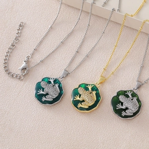 Enameled frog pendant necklace with micro-pave crystals on a gold-plated beaded chain