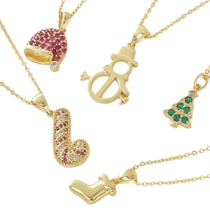 18k gold plated Christmas necklace set with festive tree snowman and stocking pendants