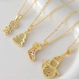Gold Christmas pendant necklaces set featuring snowman and tree with colorful zircon