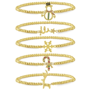 Detalle de cinco pulseras navideñas bañadas en oro de 18k con dijes de reno y muñeco de nieve