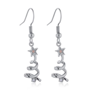 Macro detail of silver Christmas tree drop earrings with star and zircon inlay decoration