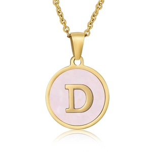Close-up of gold stainless steel necklace with pink round letter D pendant detail