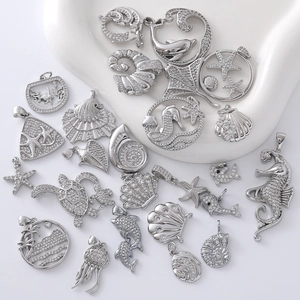 Silver ocean jewelry charms with sea horse and shell pendants inlaid with white zircon