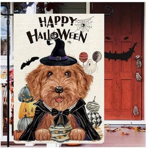Close-up of Halloween garden flag with poodle in wizard hat and pumpkin decor