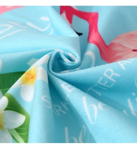 Close-up of microfiber Easter rabbit chair cover fabric with flamingo floral print