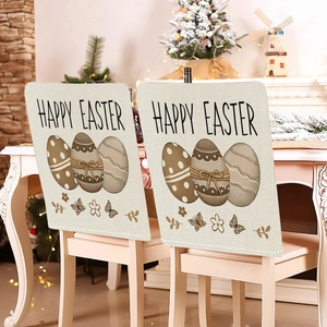 Set of 2 linen Easter chair back covers with Happy Easter lettering and colorful egg patterns