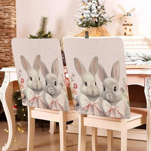 Detail of Easter chair covers with cute bunny prints and pink bows on linen fabric