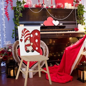 Detail view of Valentine's chair cover with a cute gnome and heart for home holiday decor