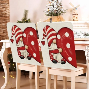 Detail of red gnome chair covers with heart pattern and textured linen fabric material
