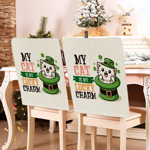 Detail of St. Patrick’s Day chair covers with lucky cat and shamrock print on linen fabric