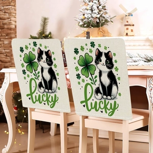 Detailed view of Saint Patrick's Day chair covers with lucky cat and clover design