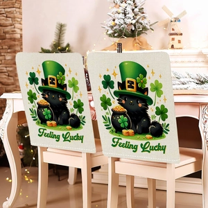 Detail of St. Patrick's Day chair covers featuring festive cats and green clovers