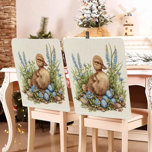 Close-up of Easter chair back covers with blue floral bunny and vintage duck pattern
