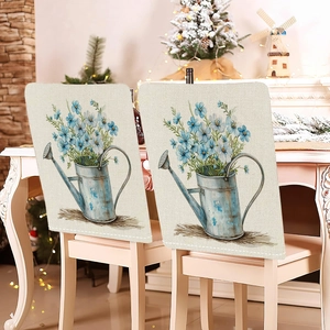Detail of two floral bunny chair covers on wooden chairs in a cozy home setting