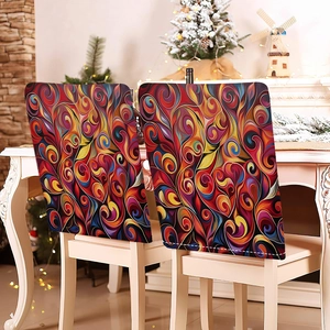 Detailed view of elastic chair covers with colorful abstract spiral patterns in a home setting