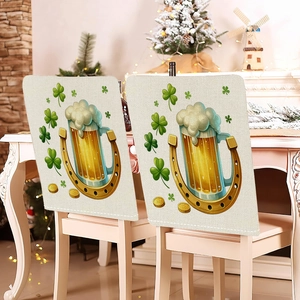 Detail of St. Patrick's Day chair covers featuring clover, beer mugs, and gold coins