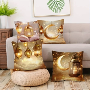 Set of four gold moon Ramadan cushion covers on a grey sofa with festive decor